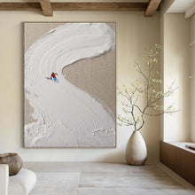 Load image into Gallery viewer, “Ski Slope Impasto” ,Cream - colored impasto forming a ski slope, with a small skier in red and blue. DTP311