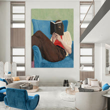 Load image into Gallery viewer, “Bookish Retreat” ,Soft green background, blue armchair, brown pants, white and red clothing, with a figure reading a book. DTP303
