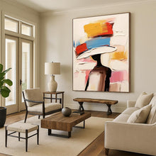 Load image into Gallery viewer, “Color - Blocked Hat Figure” – Abstract figure with a hat of bold color blocks (yellow, red, blue, white). DTP324