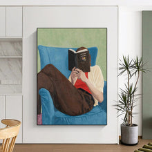Load image into Gallery viewer, “Bookish Retreat” ,Soft green background, blue armchair, brown pants, white and red clothing, with a figure reading a book. DTP303