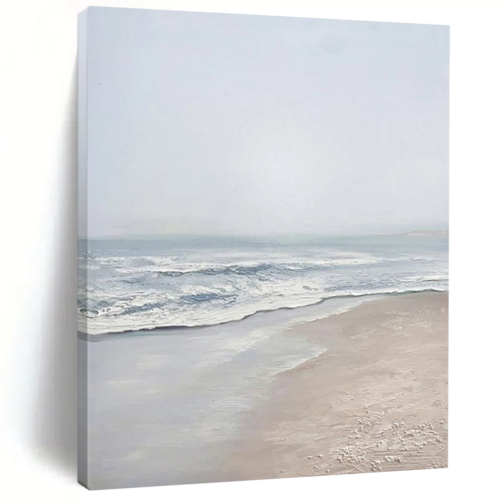 “Serene Shore” ，Soft gray - blue sky, gentle blue and white waves, beige sand, creating a calm beach scene. DTP310