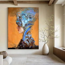 Load image into Gallery viewer, “Color - Stacked Headdress Figure” – Orange background, with blue, brown, and other colors stacked to form a headdress and clothing. DTP348
