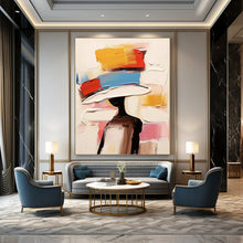 Load image into Gallery viewer, “Color - Blocked Hat Figure” – Abstract figure with a hat of bold color blocks (yellow, red, blue, white). DTP324
